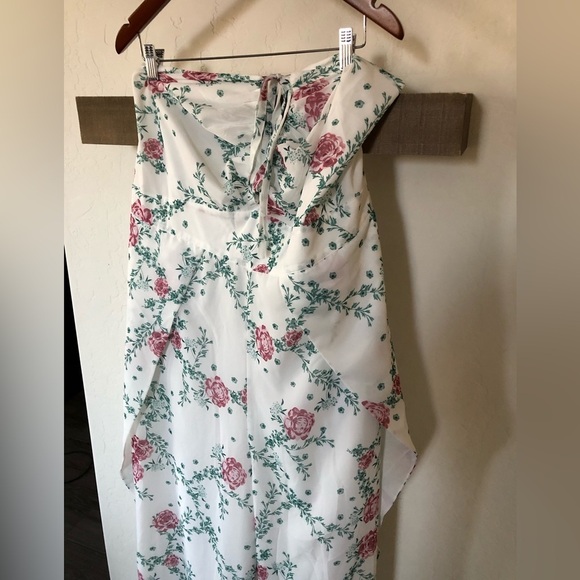 Eloquii|White chiffon floral halter jumpsuit with wide leg, open leg detail•••22 - Picture 7 of 17